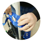 Blue ladder belt strap secure to transfer device with person using on white background