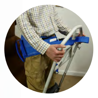 Person using a transfer aid with a blue belt for support